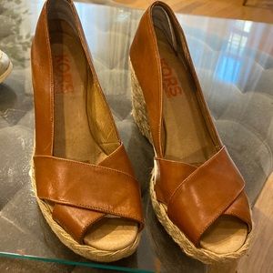 Michael Kors brown leather peep toe wedge sandal.